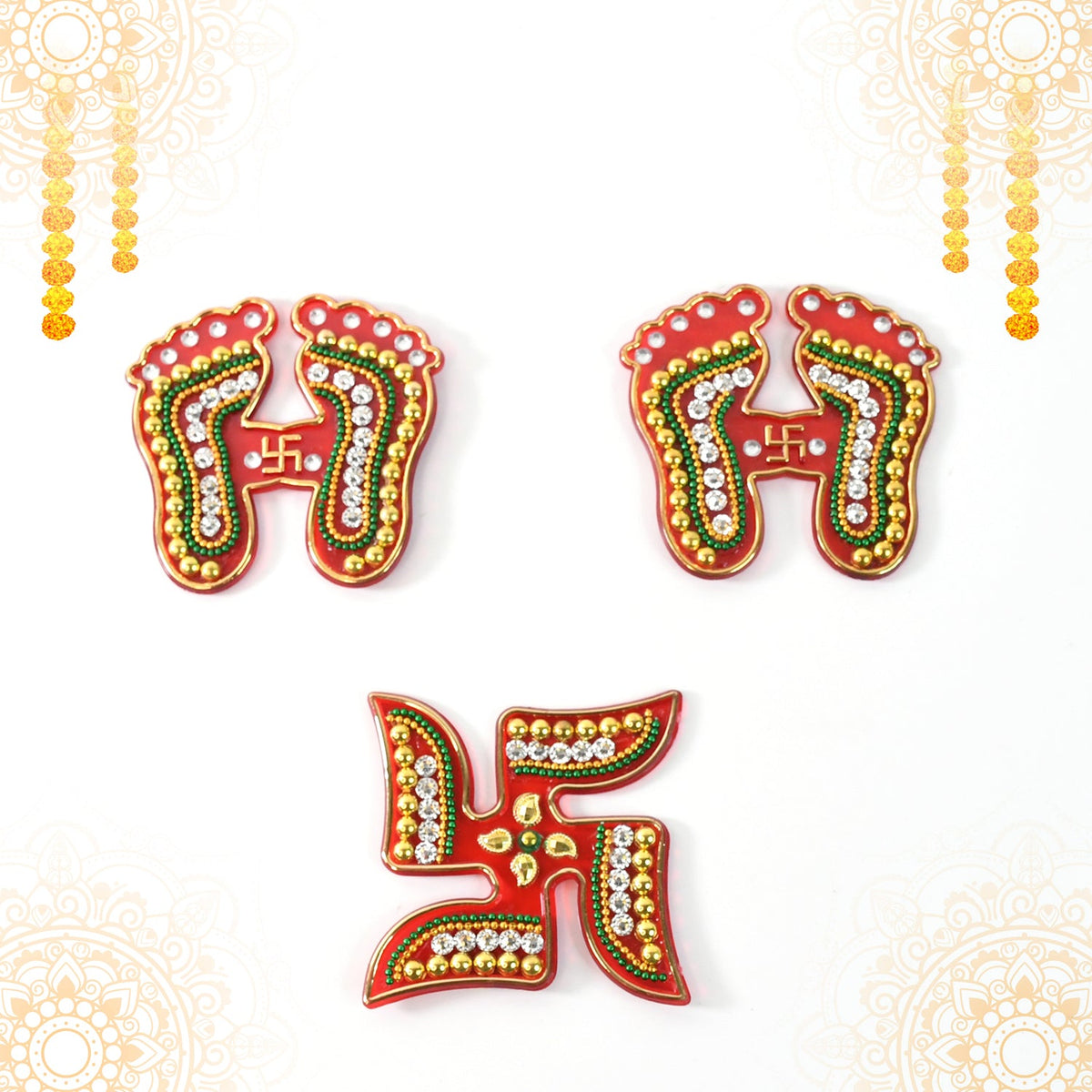 Assorted Laxmi Charan and Swastik decals in bright hues for Diwali décor