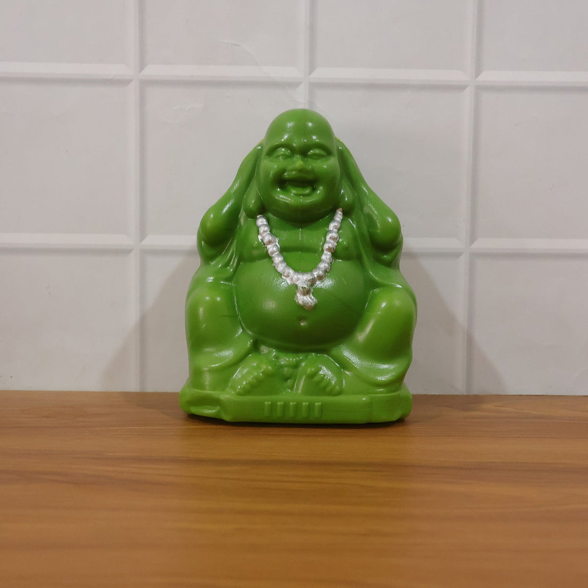 Live display of Laughing Buddha coin saving box