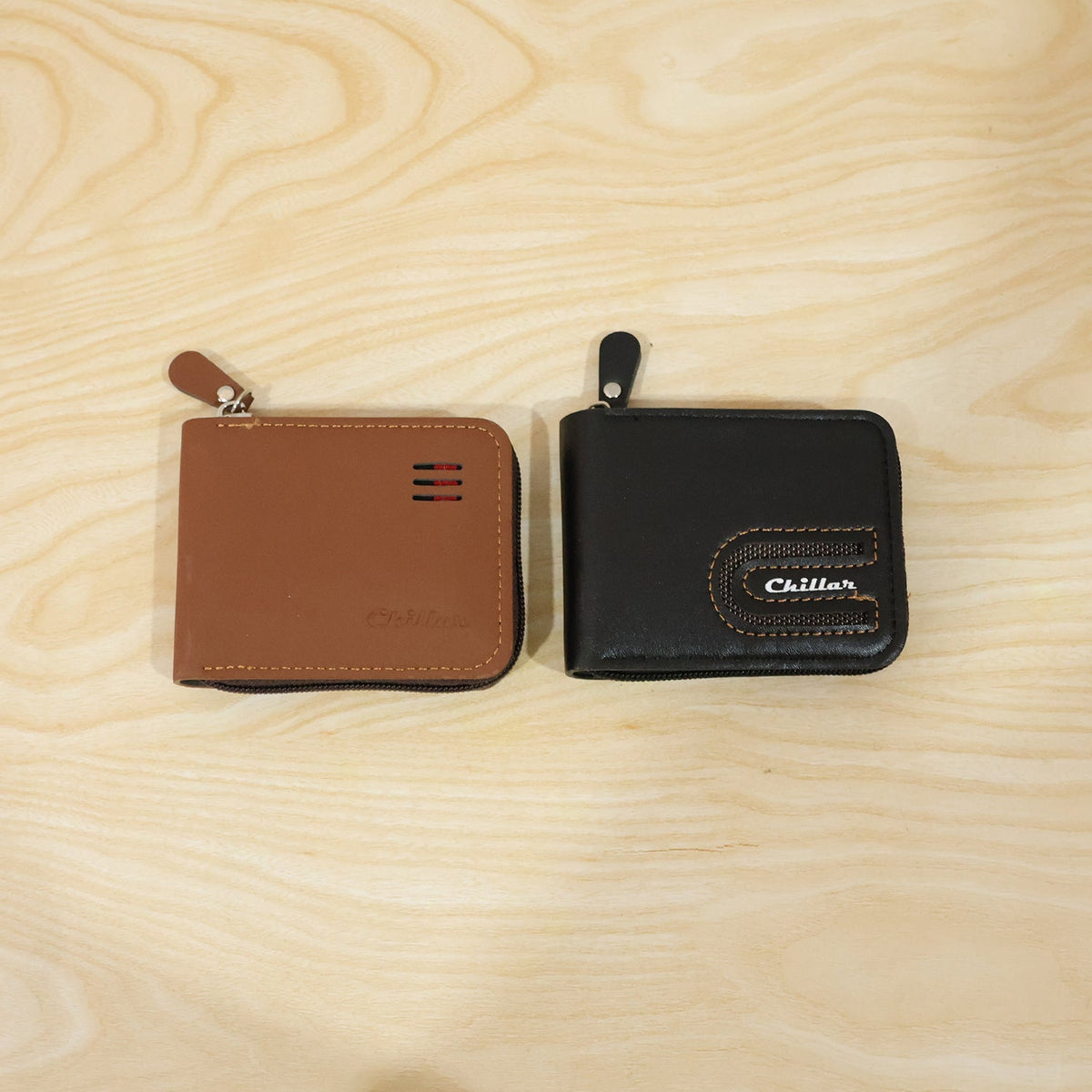 Live shot of man holding zip-around card holder wallet showing texture