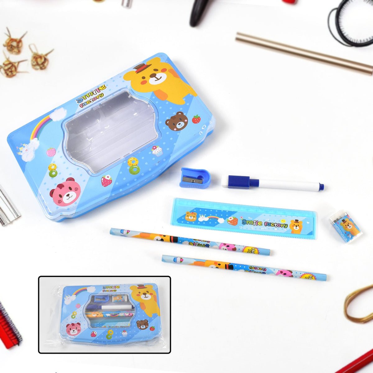 Close-up of the durable metal compass box featuring a playful cartoon design for school children.