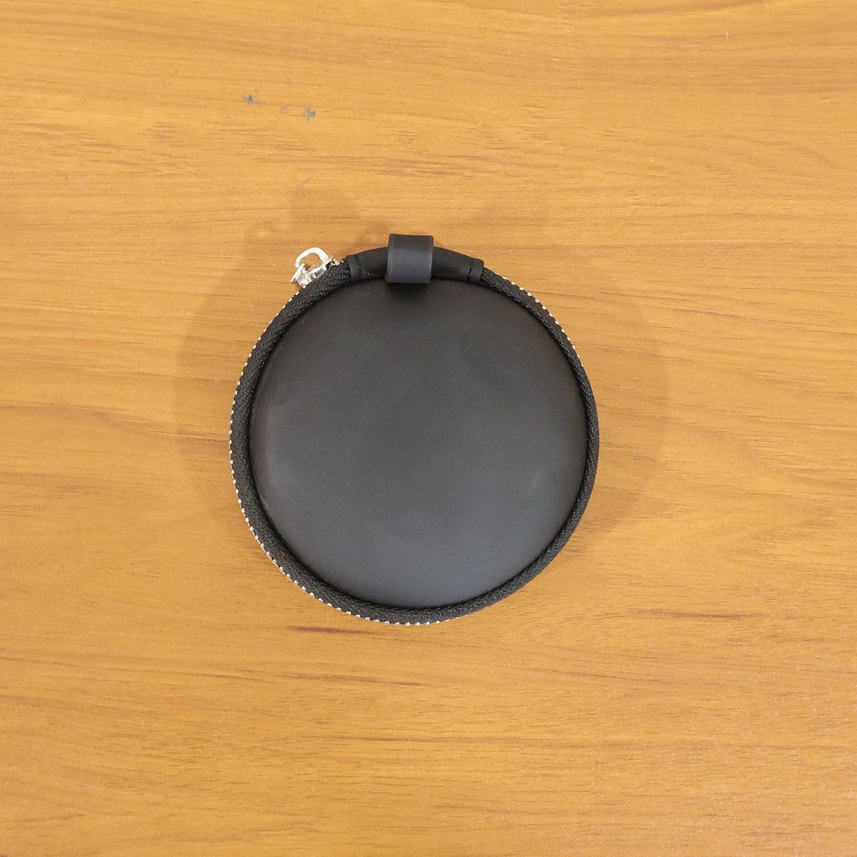 Zipper pouch for earbud storage
