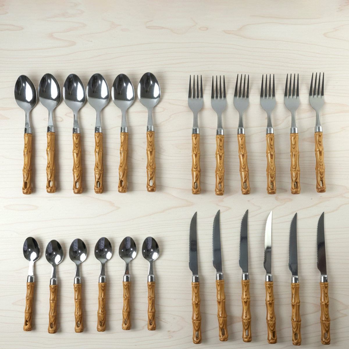 Kitchen spoon and fork set in stainless steel