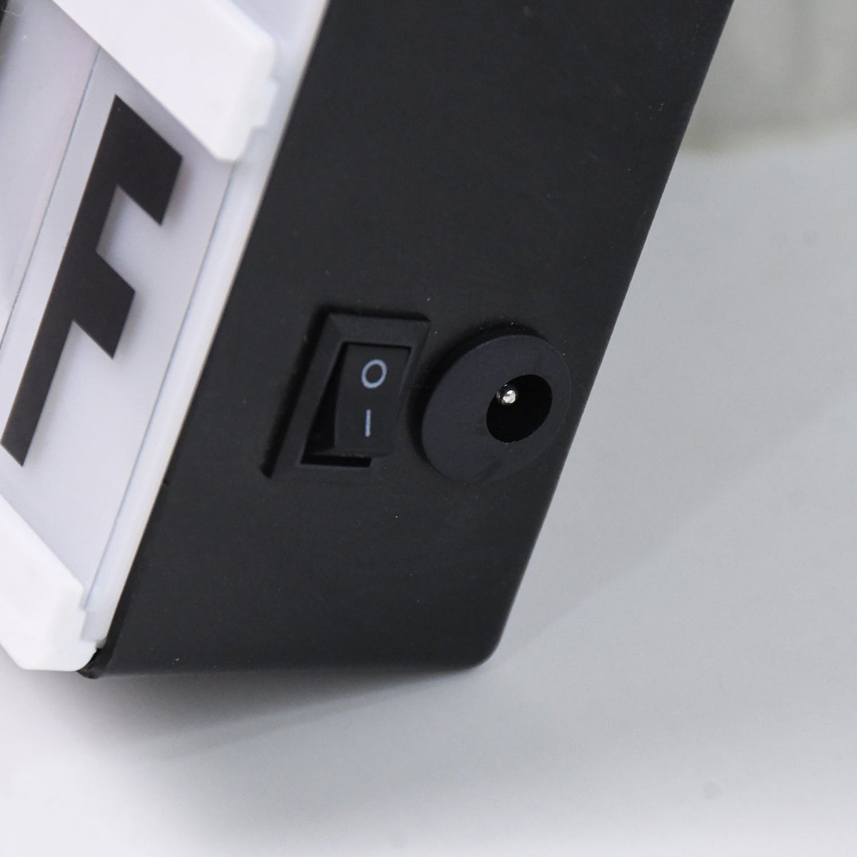 Close-up of the magnetic letter box with various characters and emojis, ready for customisation.