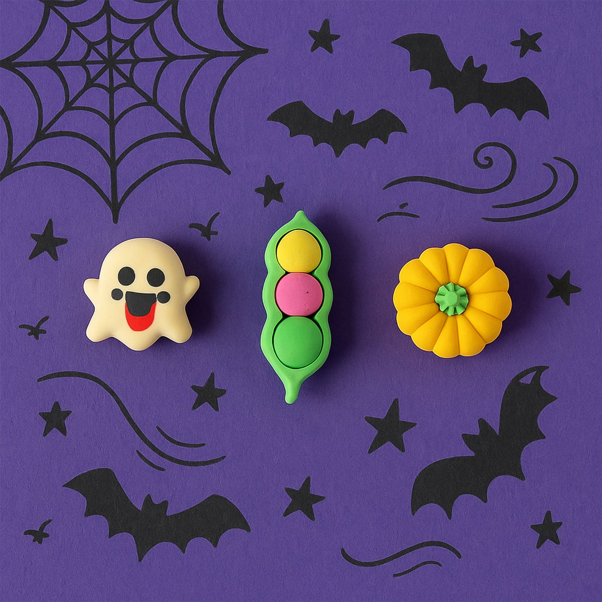 Multiple soft rubber cartoon erasers in different playful shapes, perfect for school stationery.