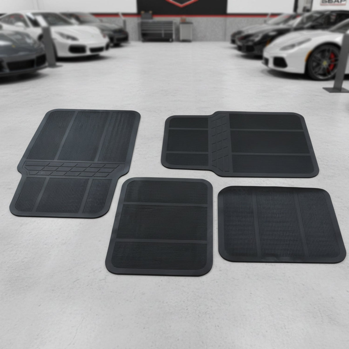 Universal vehicle floor protection mats in black rubber