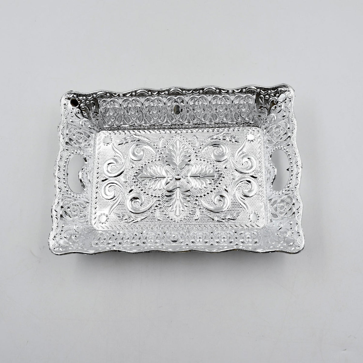 Decorative mukhwas serving tray beautifully arranged on a modern dining table.