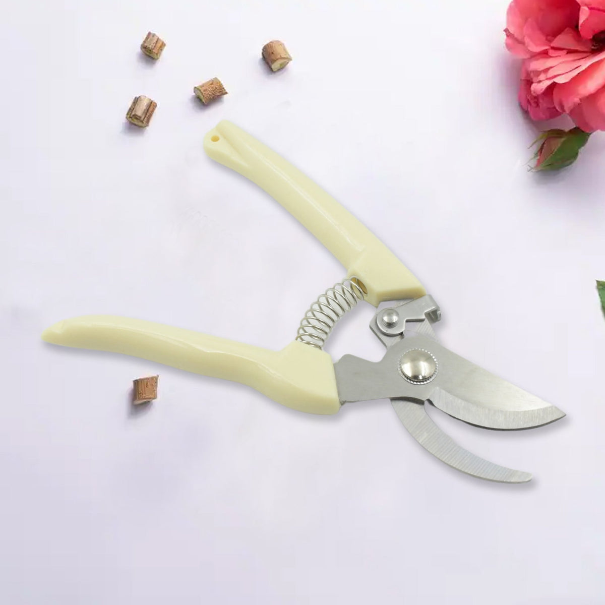 Stainless steel pruning shears from a side view, highlighting the design.