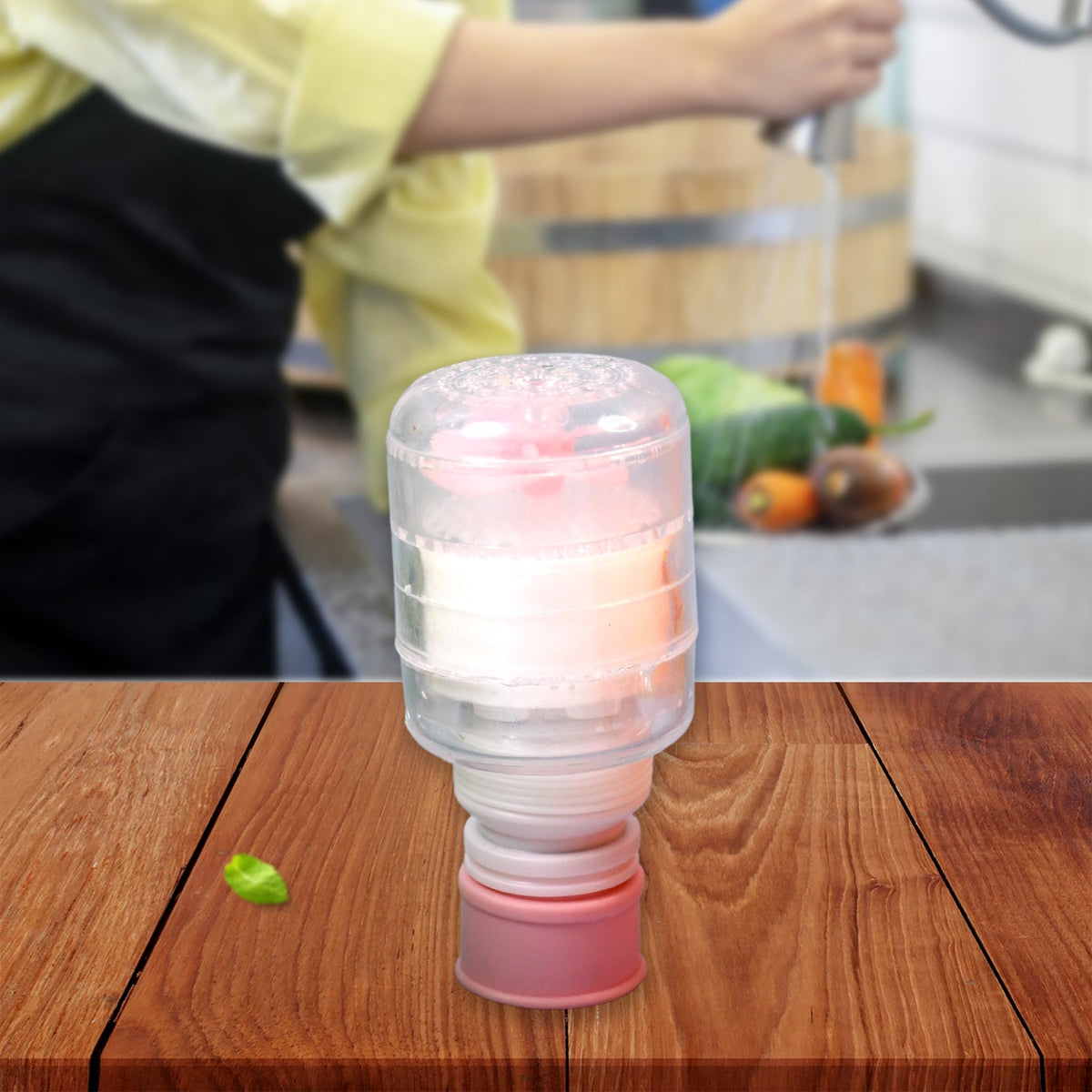 Close-up of stretchable faucet extender highlighting built-in filter