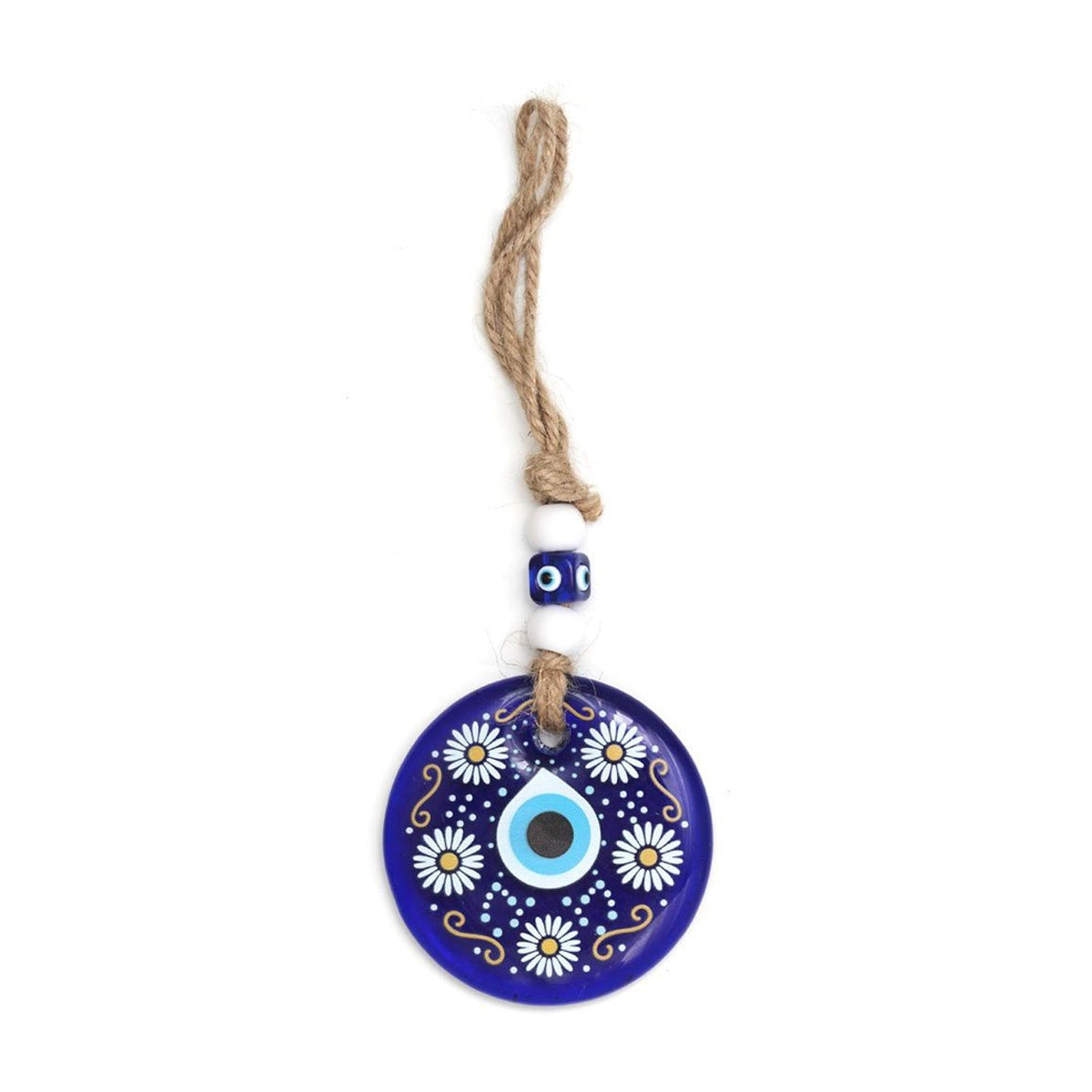 Detailed view of Evil Eye Wall Hanging's blue eye and ornamental bead accents