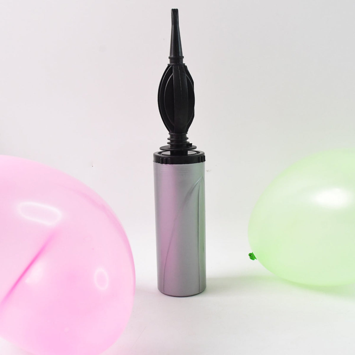 Manual hand pump used for inflating balloons and inflatables