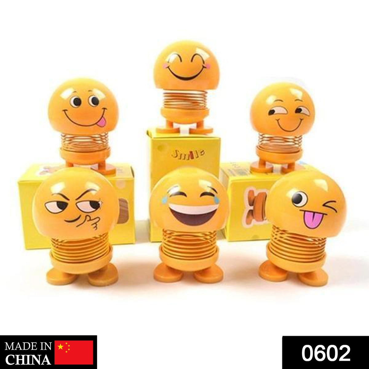 Front view of a funny bobblehead smiling face spring doll for desk decor.