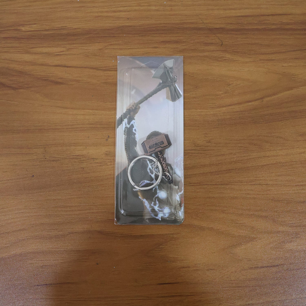 Close-up detail of metal hammer shape on keychain
