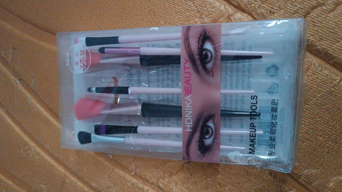 Compact travel-friendly soft makeup brush set inside pouch ready for use