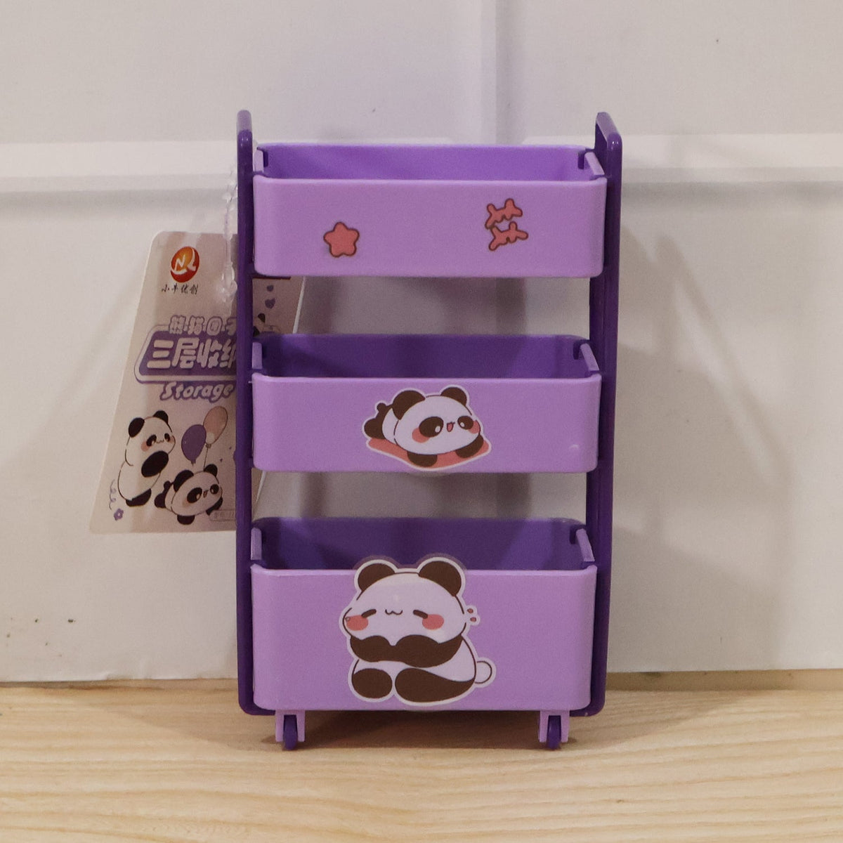 Mini storage trolley used to organize cosmetics on a dressing table.