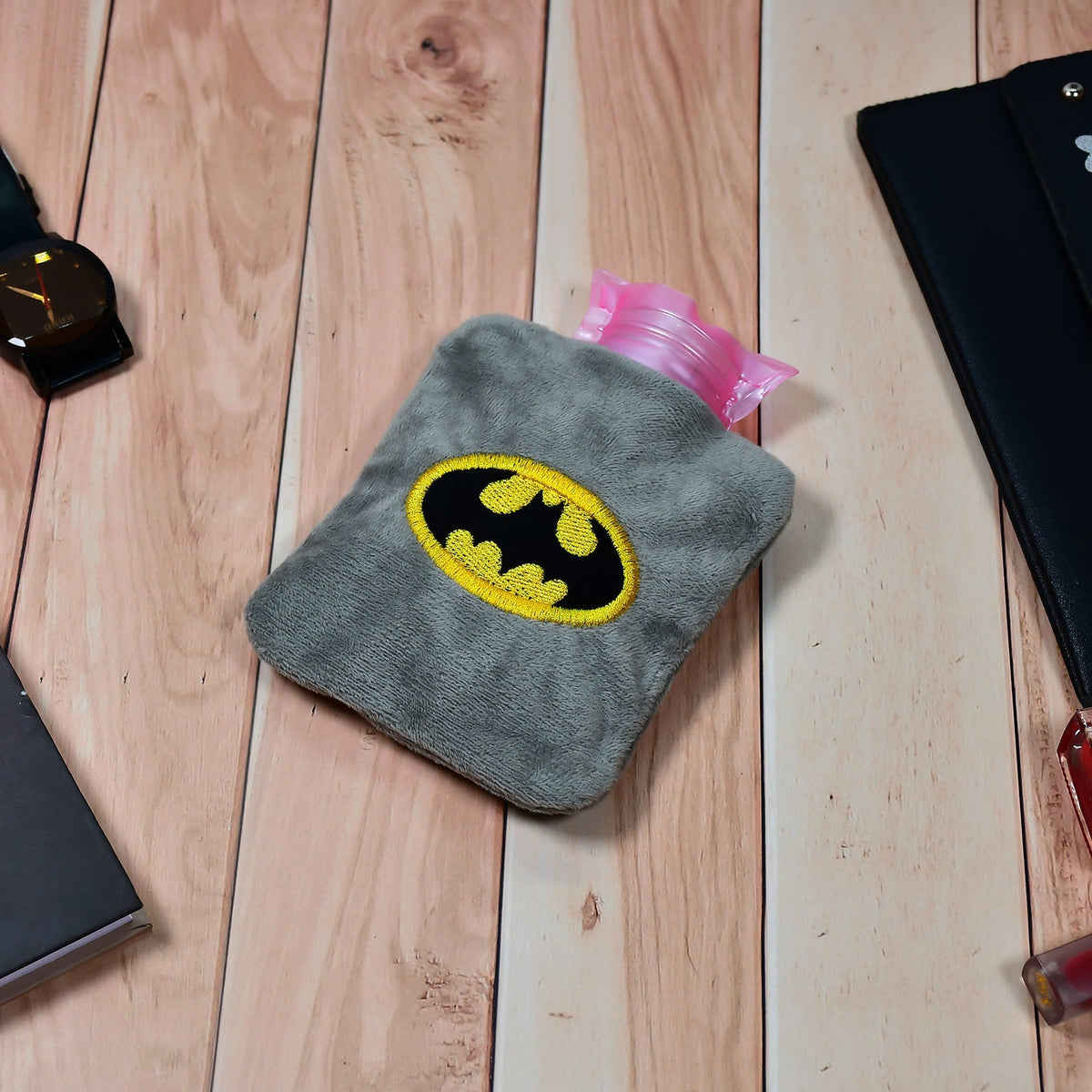 Close-up of Batman Hot Water Bag, effective for neck and shoulder pain relief.
