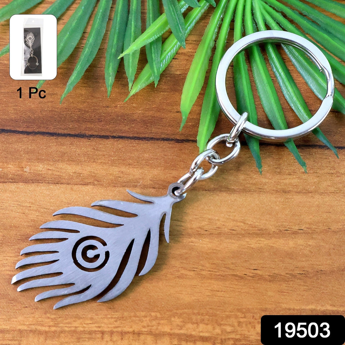 Artistic peacock feather pendant keyring in polished stainless steel