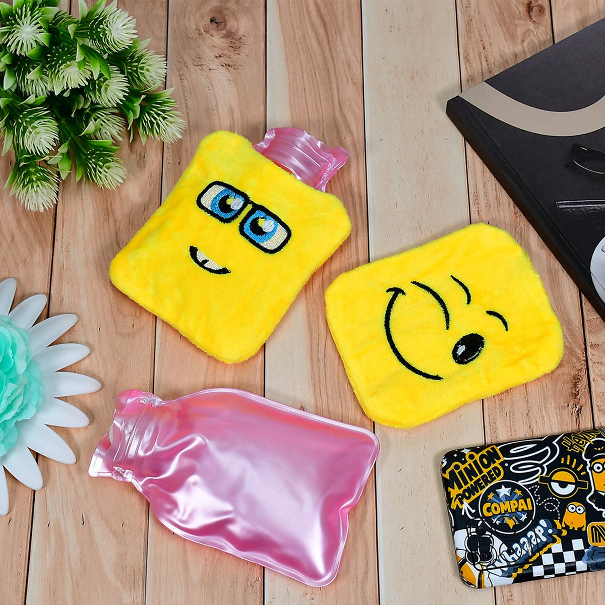 Close-up of a yellow emoji Mini Hot Water Bag, highlighting its soft fabric cover and texture.