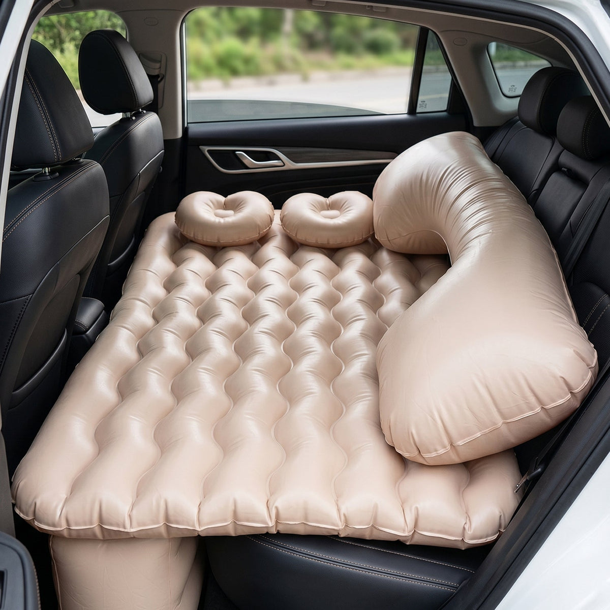 Complete car air mattress set featuring pillows and electric pump for travel.