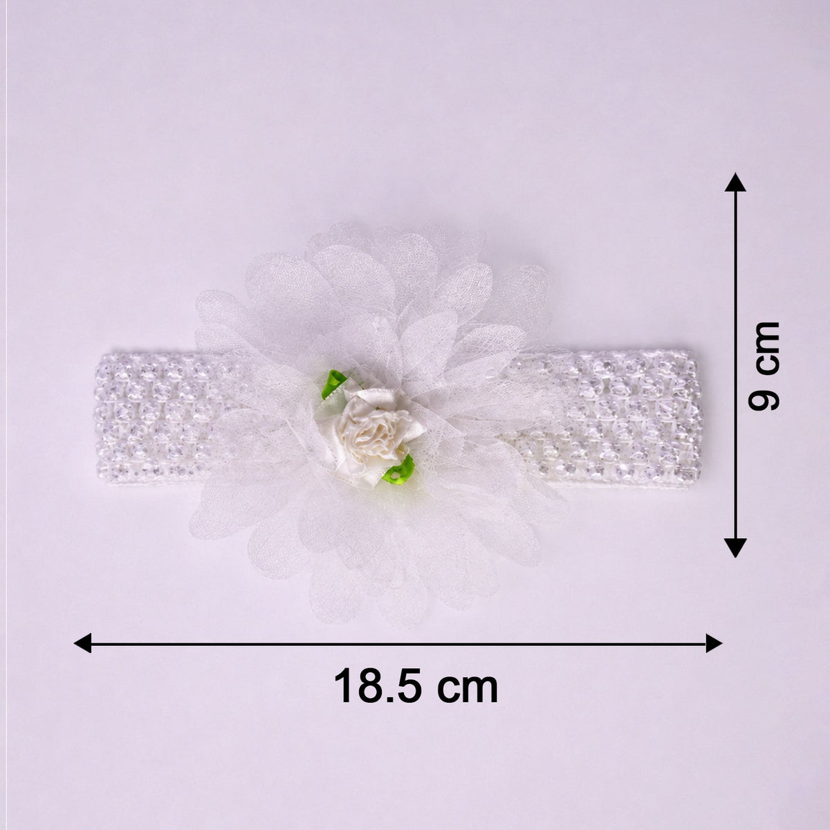Close-up of colorful floral baby headband made from elastic fabric