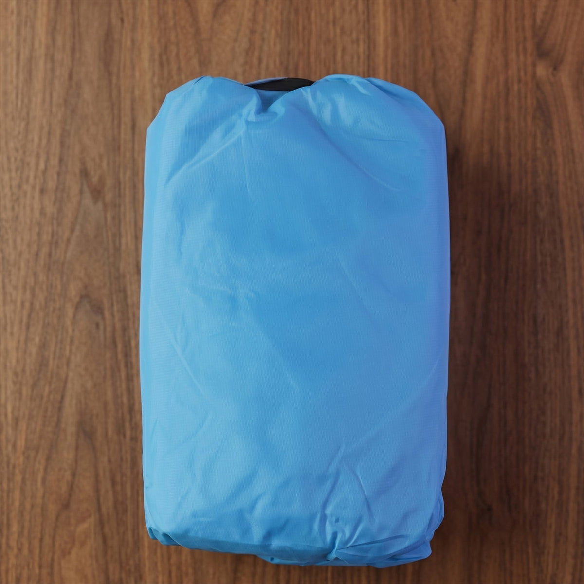 Side view of ergonomic blue inflatable air sofa
