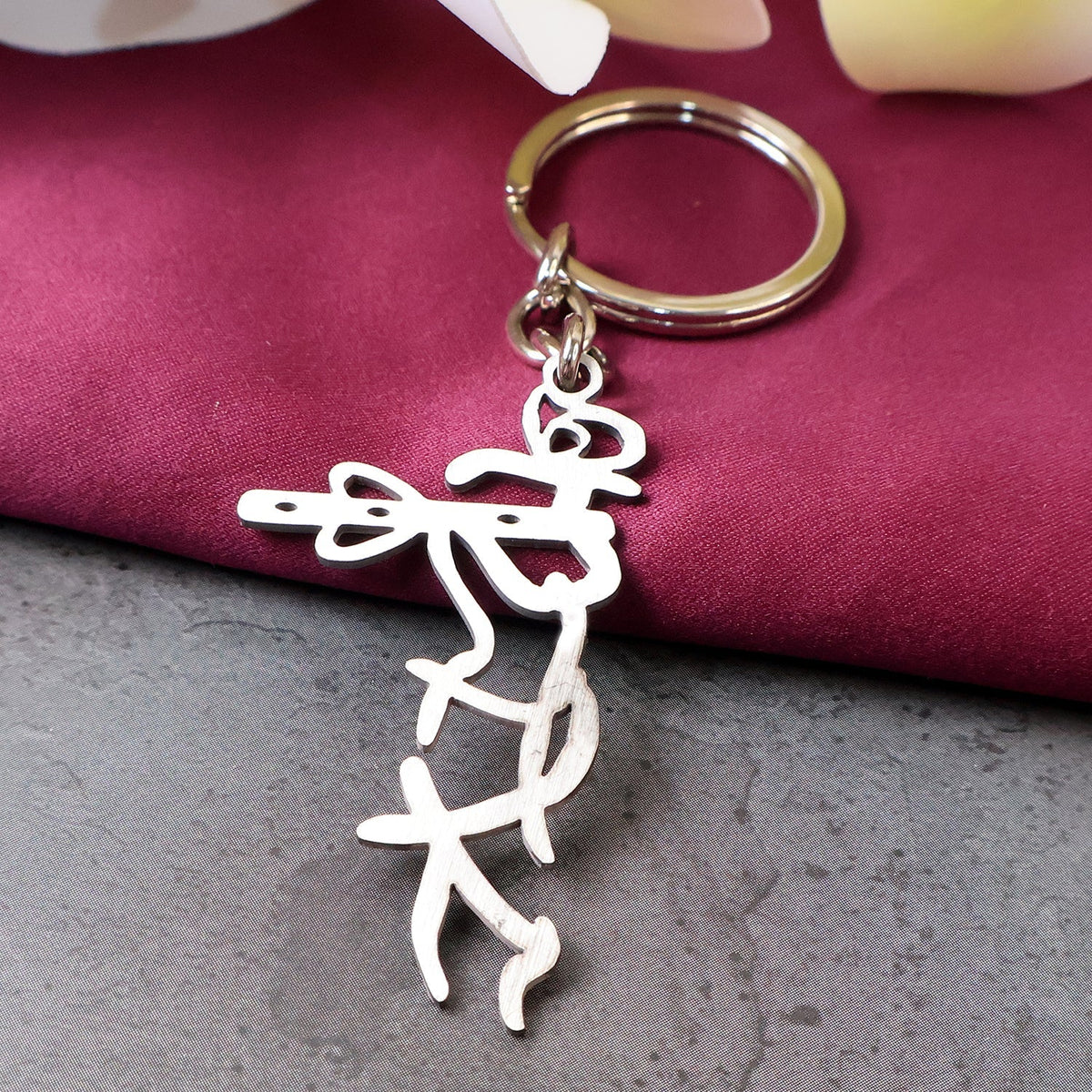 Krishna flute design stainless steel keychain with spiritual motif