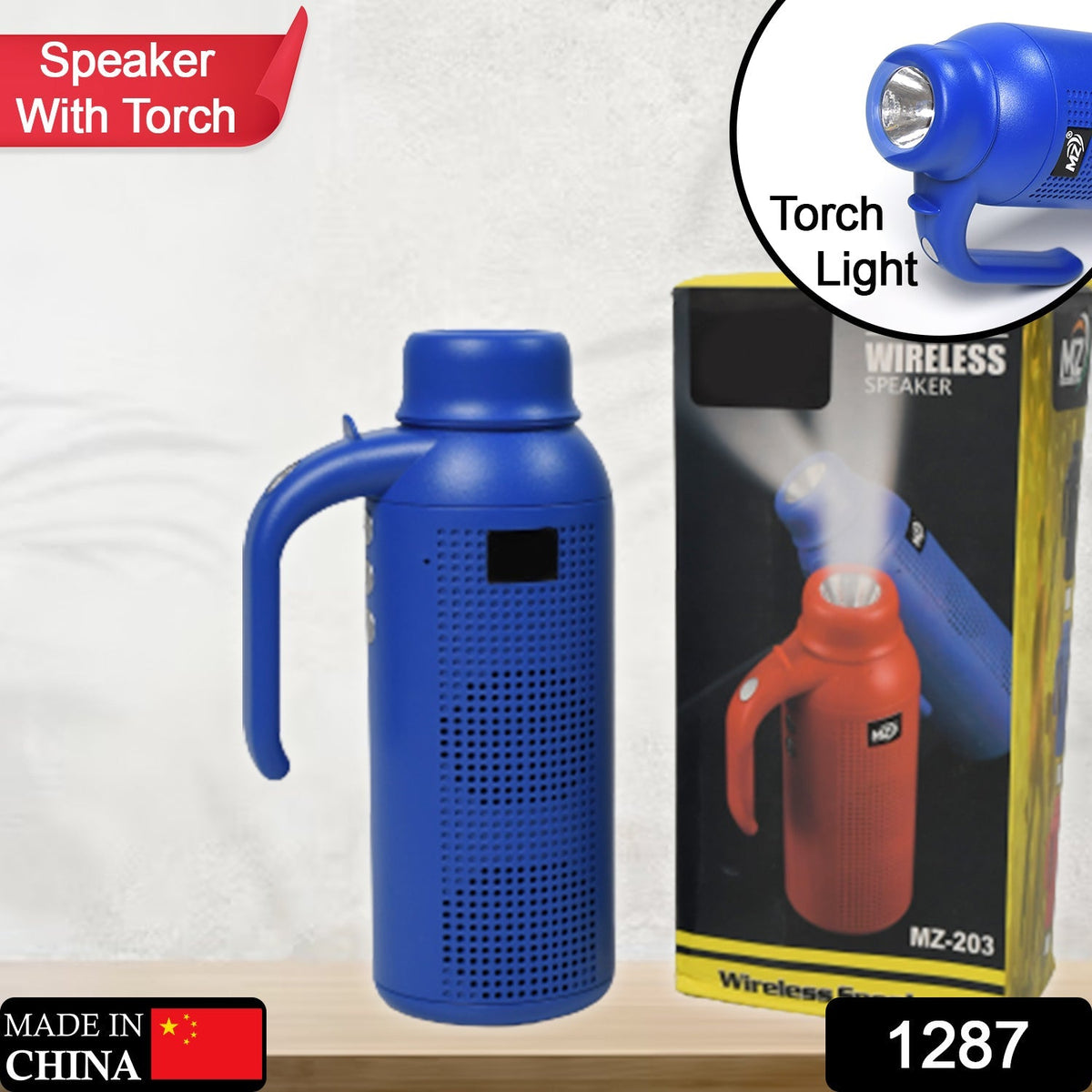 Compact wireless Bluetooth speaker with a convenient hand strap, ideal for carrying.