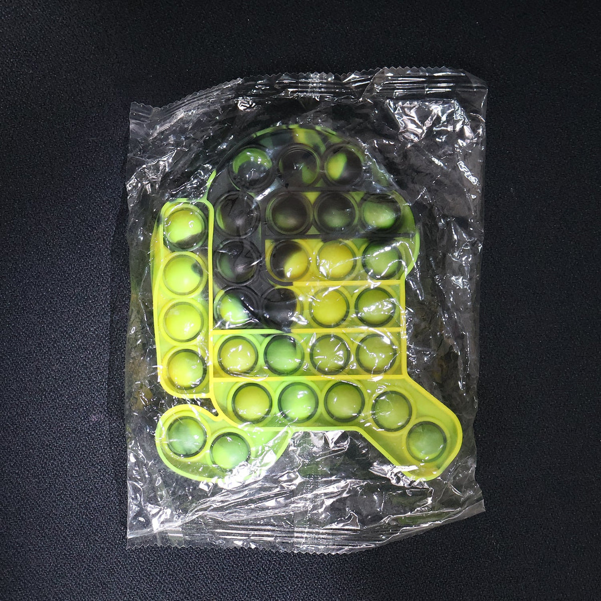 Lifestyle image of silicone pop it toy being used for relaxation and play