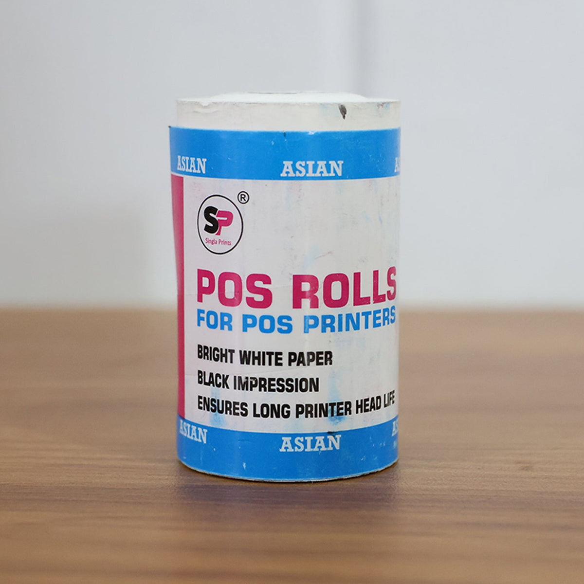Self-adhesive thermal label roll for barcode and shipping applications