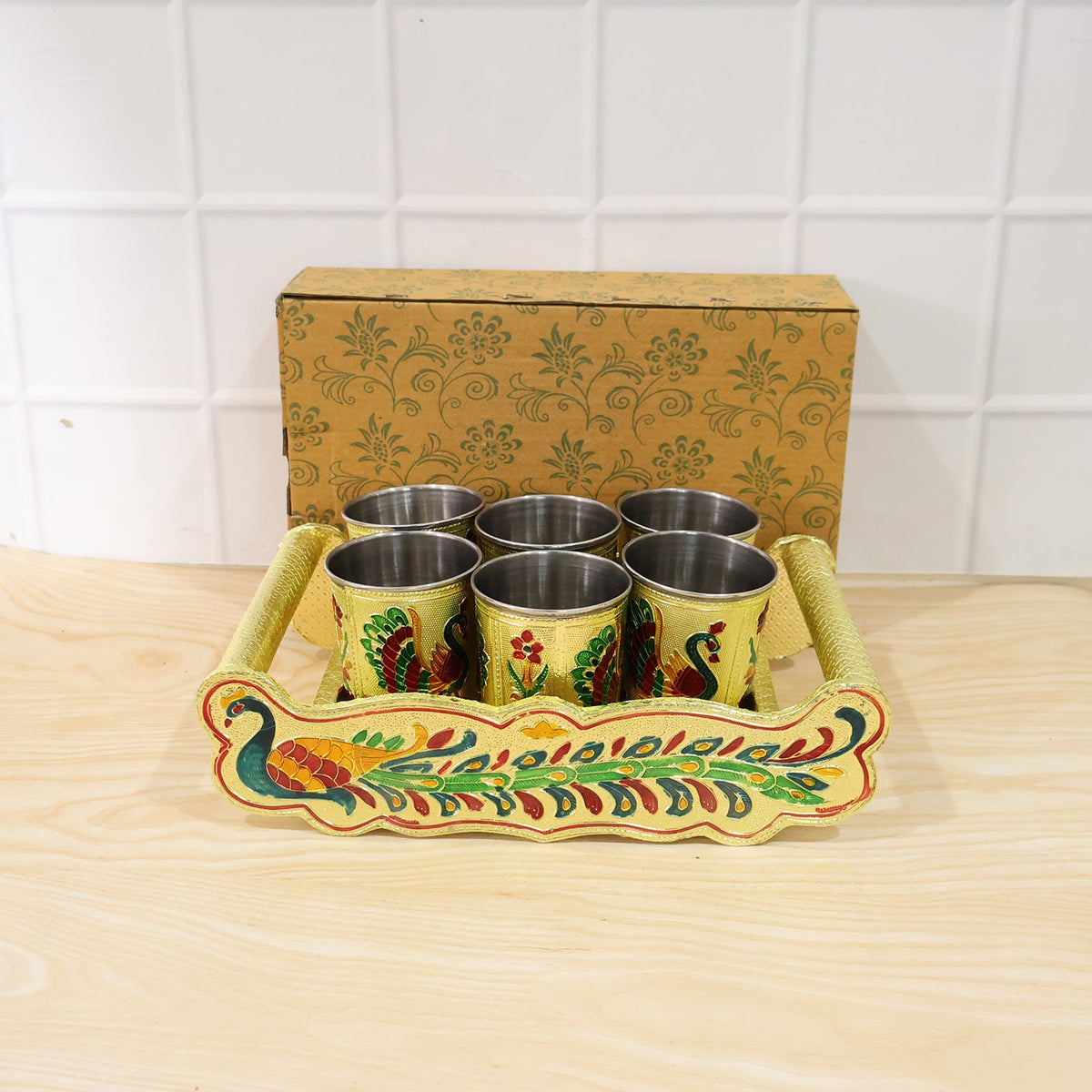 Lifestyle shot of the Minakari serving tray set in a home setting.