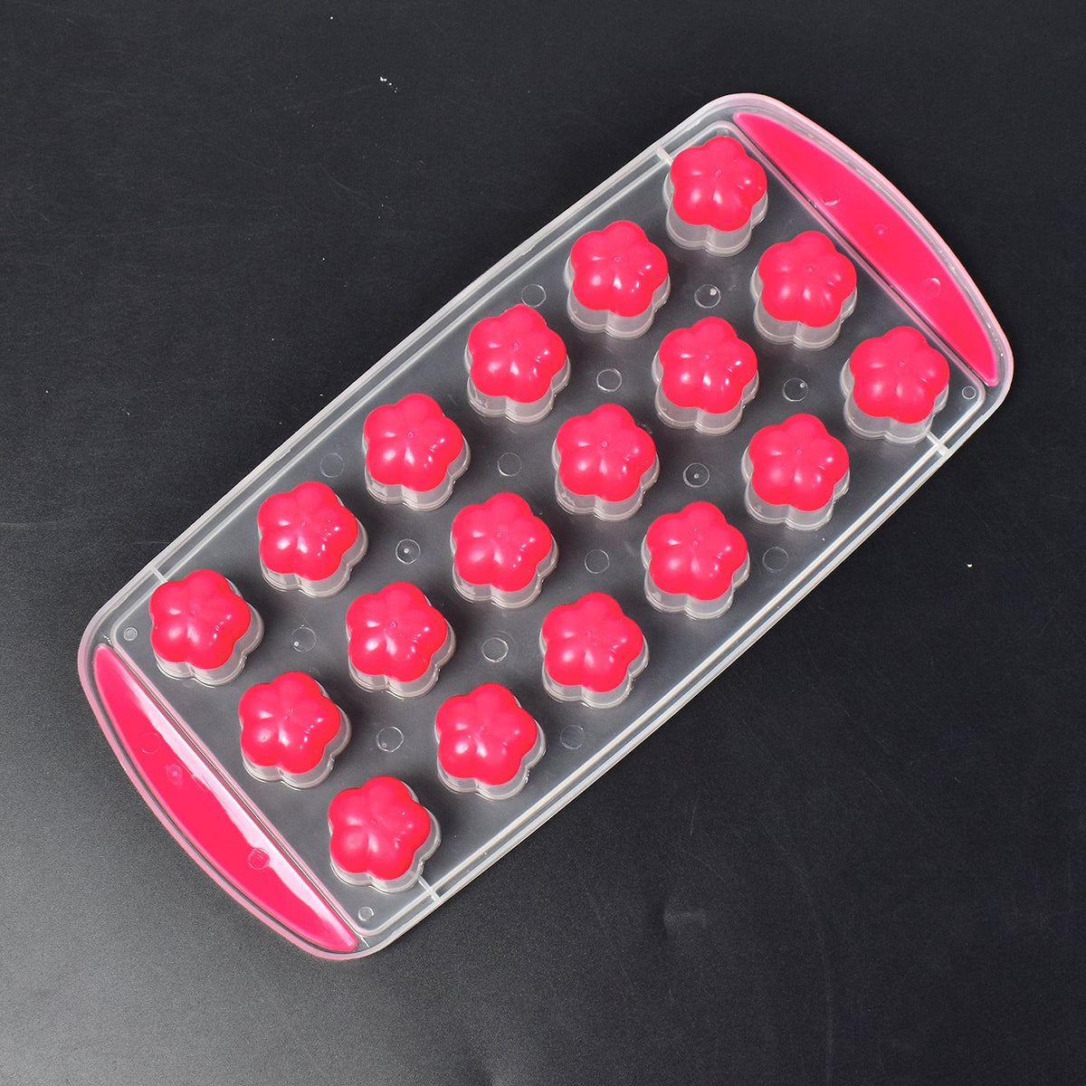 Angled view of the flexible silicone flower ice tray showcasing its unique cavities.